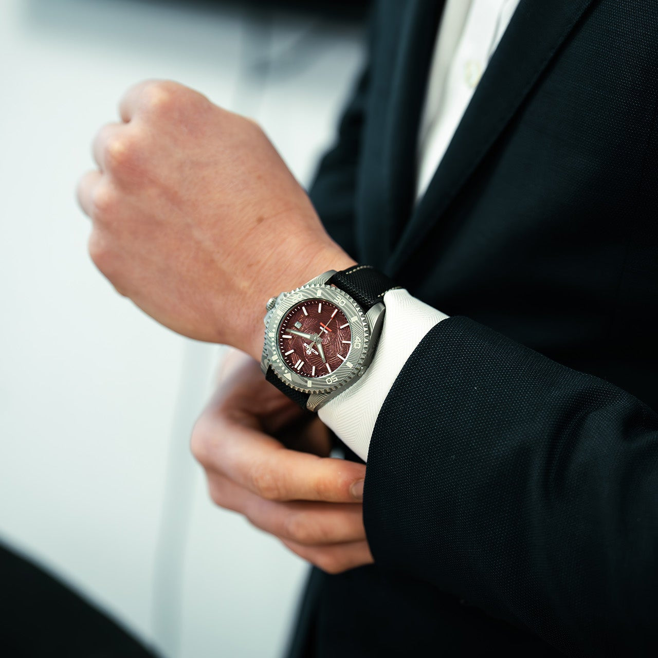 Red McQuaide 1 Damascus Steel watch on a wrist