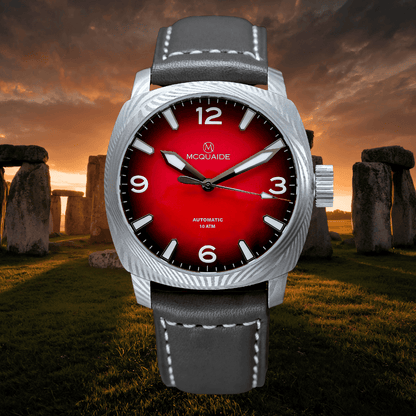 The McQuaide C1 Solstice with a black strap and stonehenge background