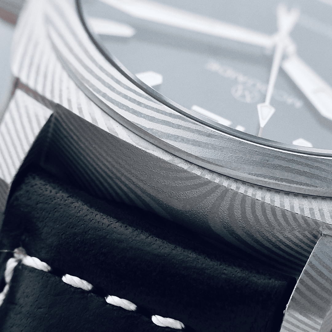 Damascus Steel detail on McQuaide C1 midnight