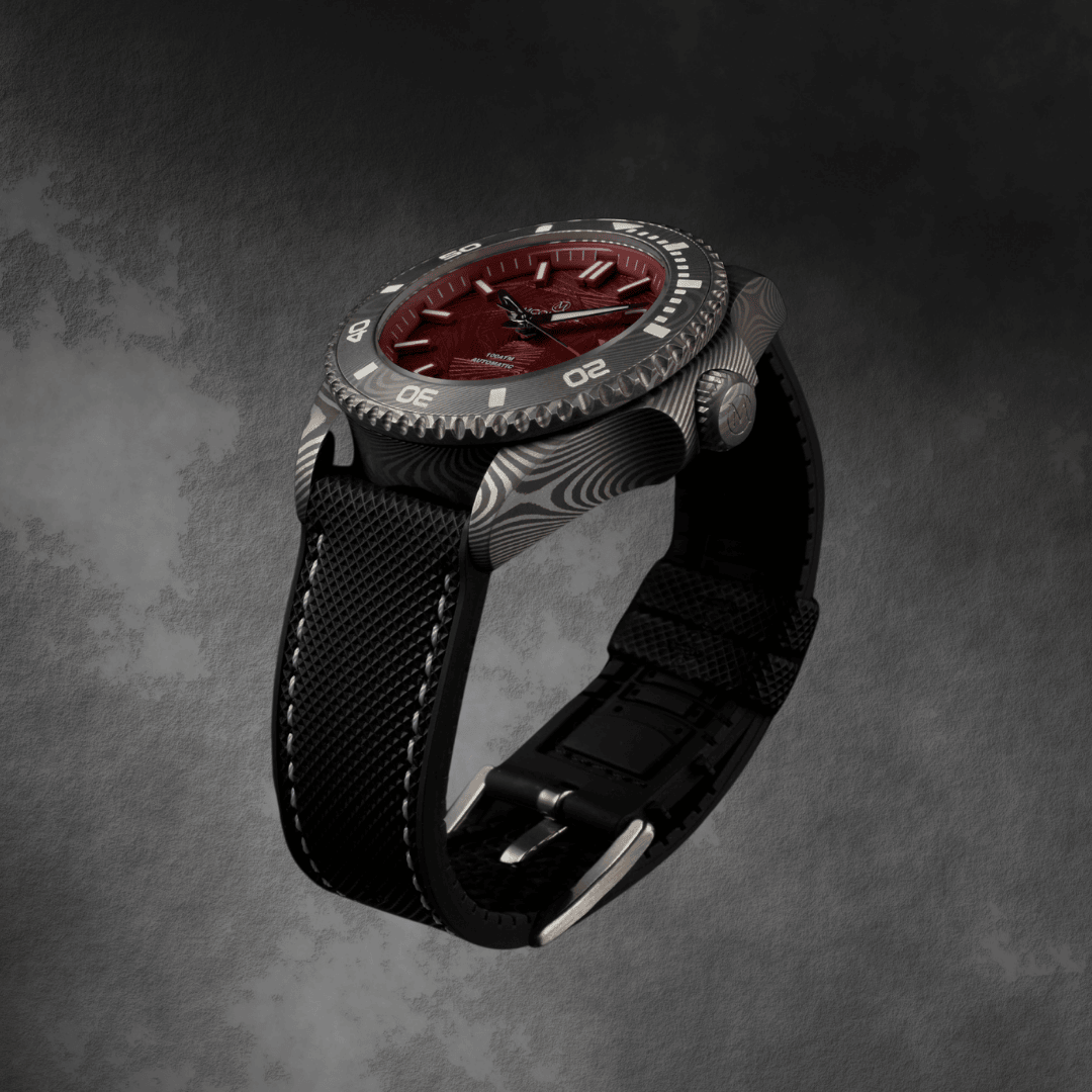 Front angle of the McQuaide Q1 Crimson Damascus Steel watch