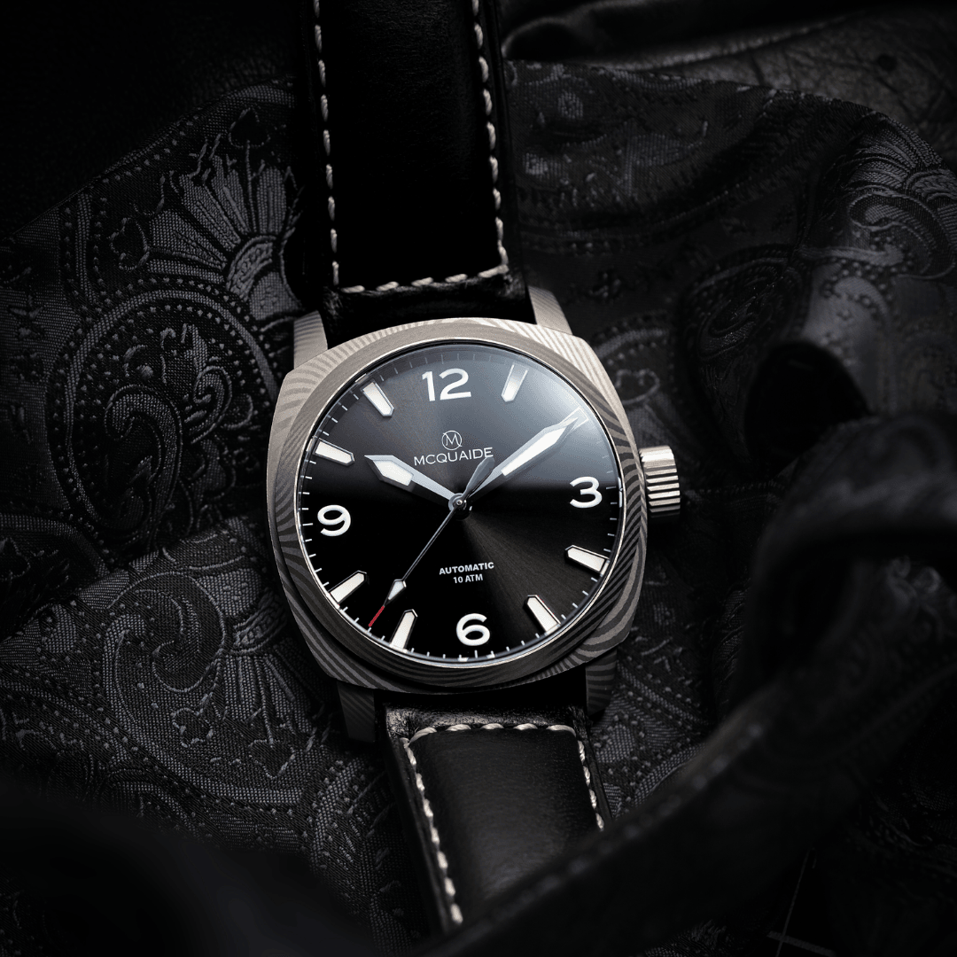 The McQuaide C1 Midnight with a black bow tie