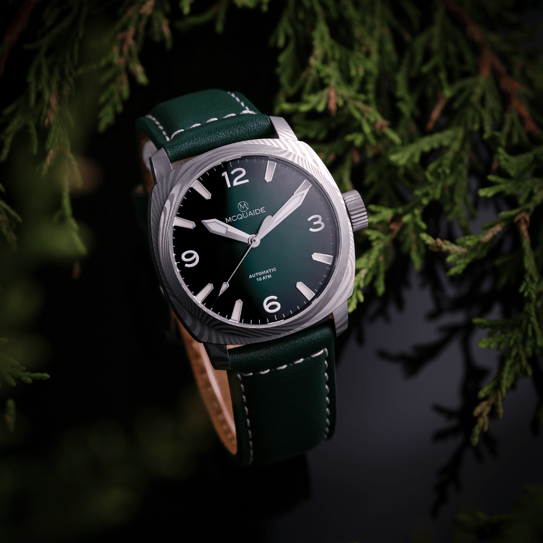 The McQuaide C1 Evergreen with leaves in the background