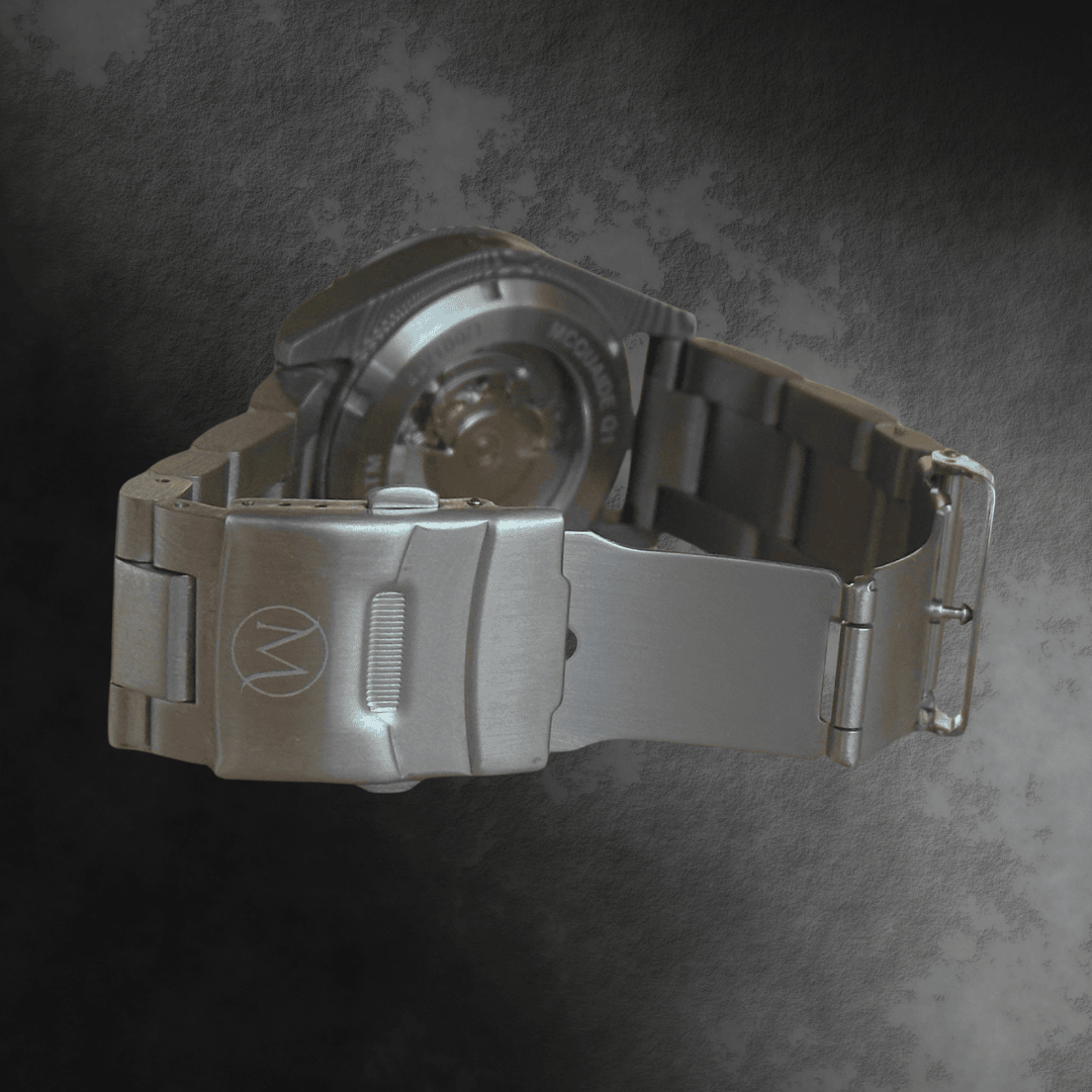 Damascus Steel watch with a detailed brushed steel bracelet on a dark textured background