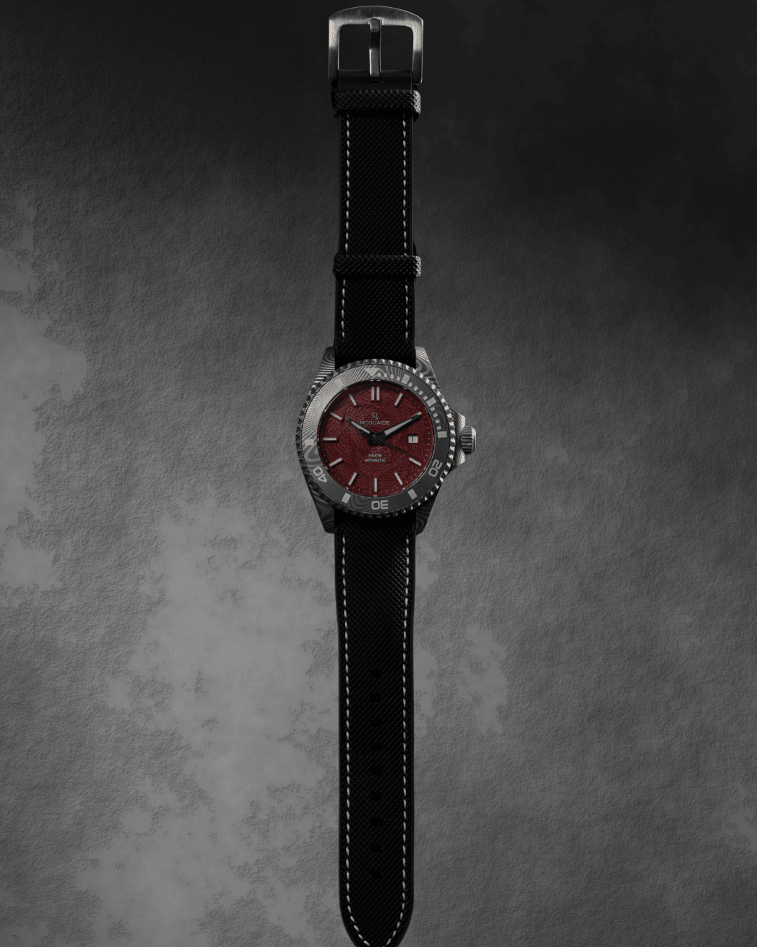 Straight photo of the McQuaie Q1 Crimson Damascus Steel watch
